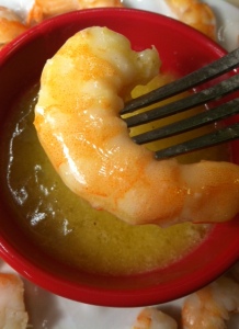 Shrimp in garlic, butter, lemon sauce - worth whatever you have to do to hold onto the shrimp.