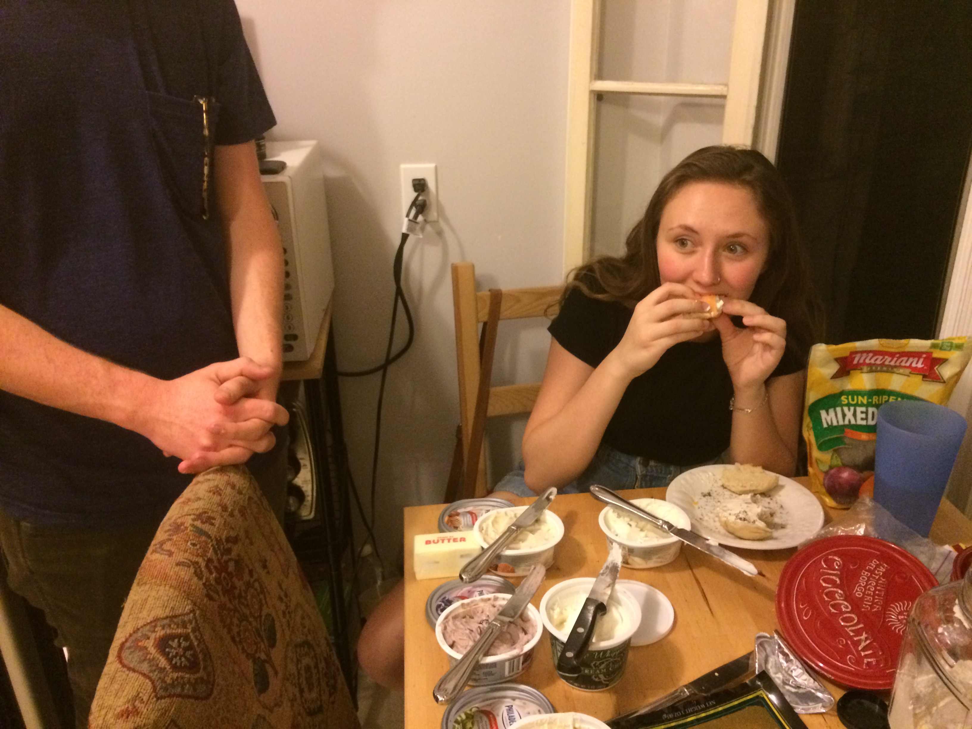Milena enjoying bagel madness.