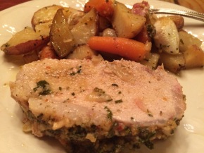 cooked pork roast with potatoes
