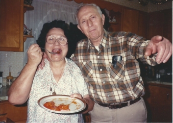 Mom and Dad with persimmons